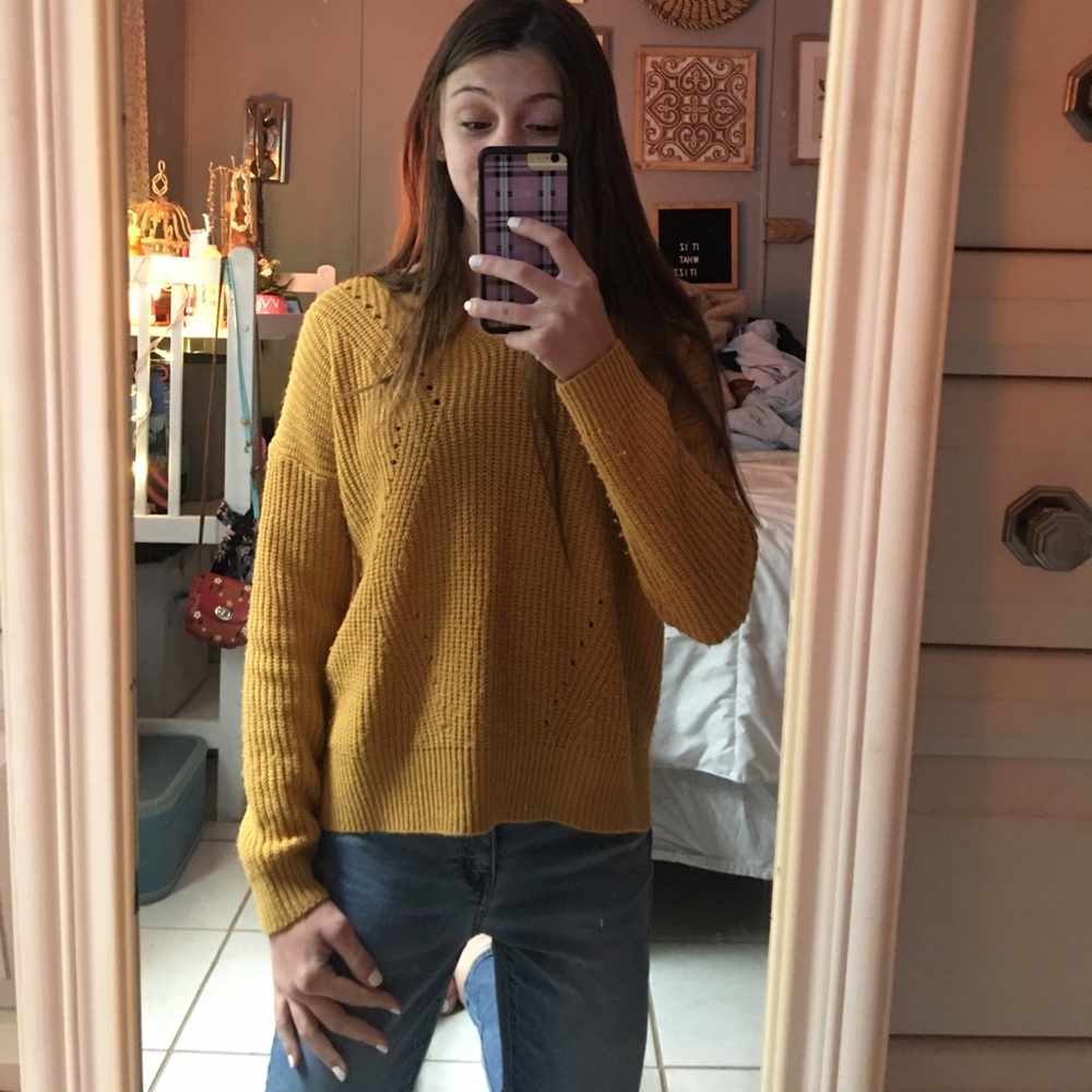 yellow sweater